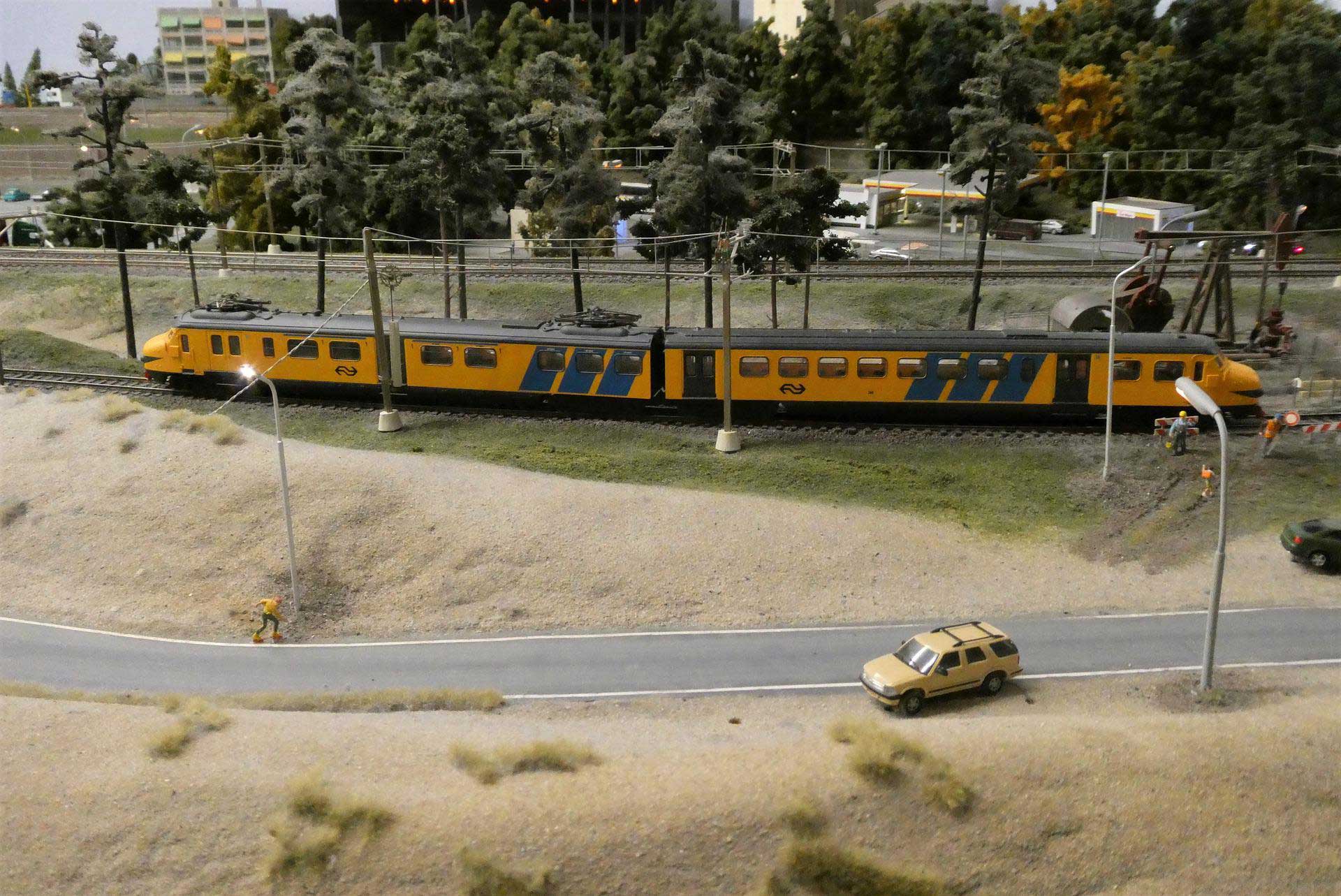 model railway scene with tufts of grass